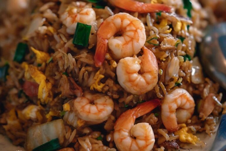 Roasted Half lobster, shrimp, calamari, scallop, mussel, egg with red onion, kaffir lime leaf in thai spicy tom yum sauce | Original Asian Kitchen